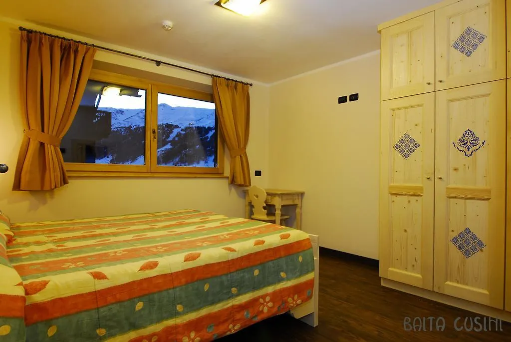 *** מלון דירות ליביניו Residence Baita Cusini איטליה